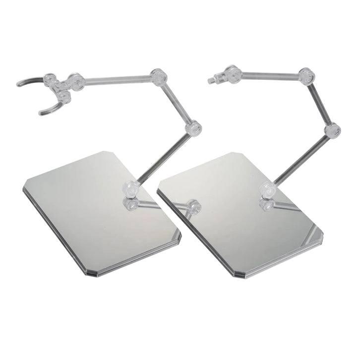 Two assembled Bandai Action Base 6 clear display stands, each with a mirror-finish base plate and an adjustable arm